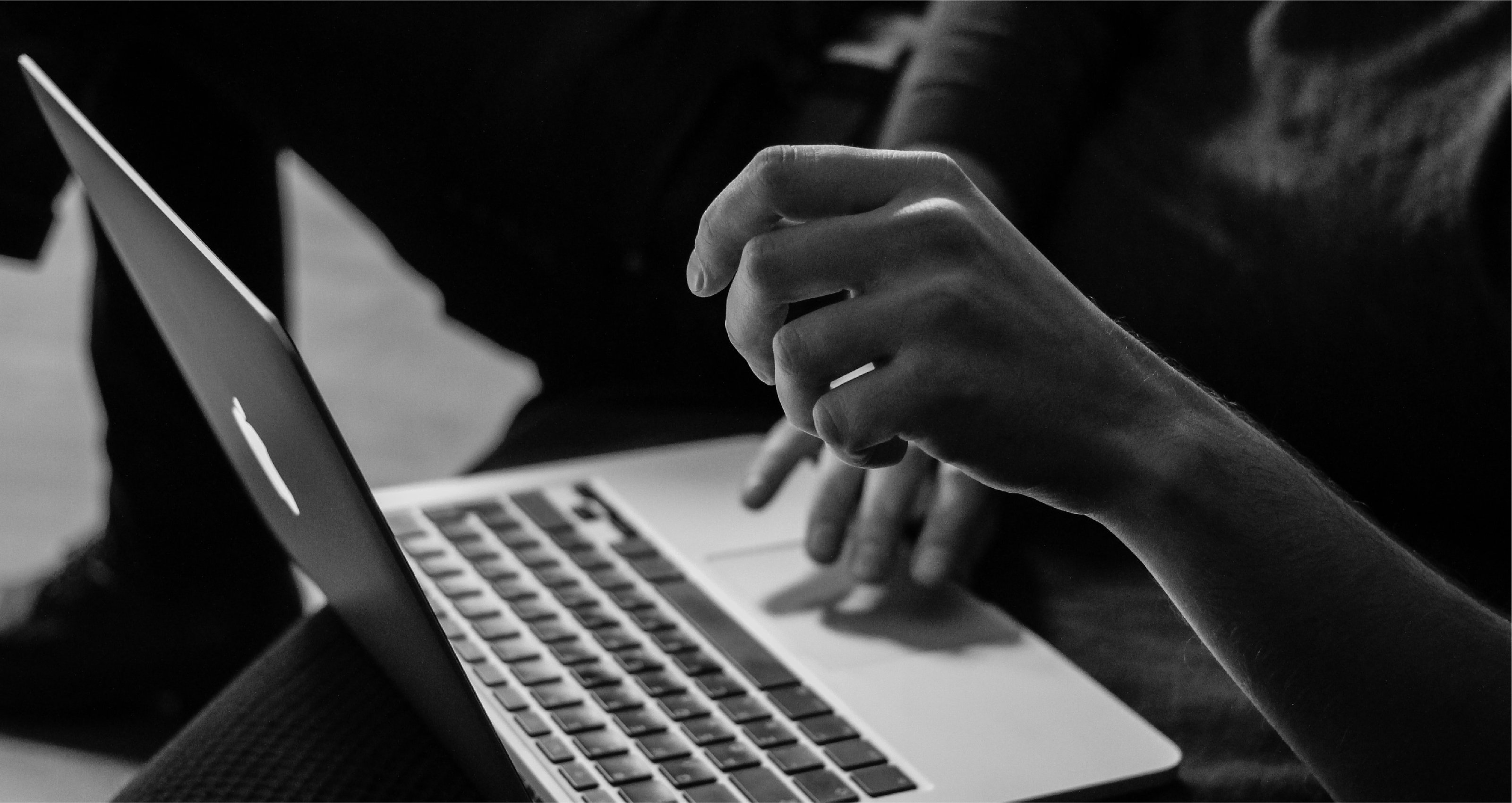 Person Using Laptop Selecting a Cloud Provider