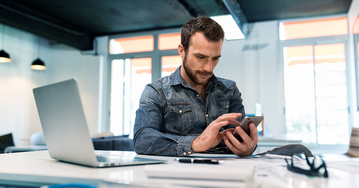 Man on phone showing single sign-on