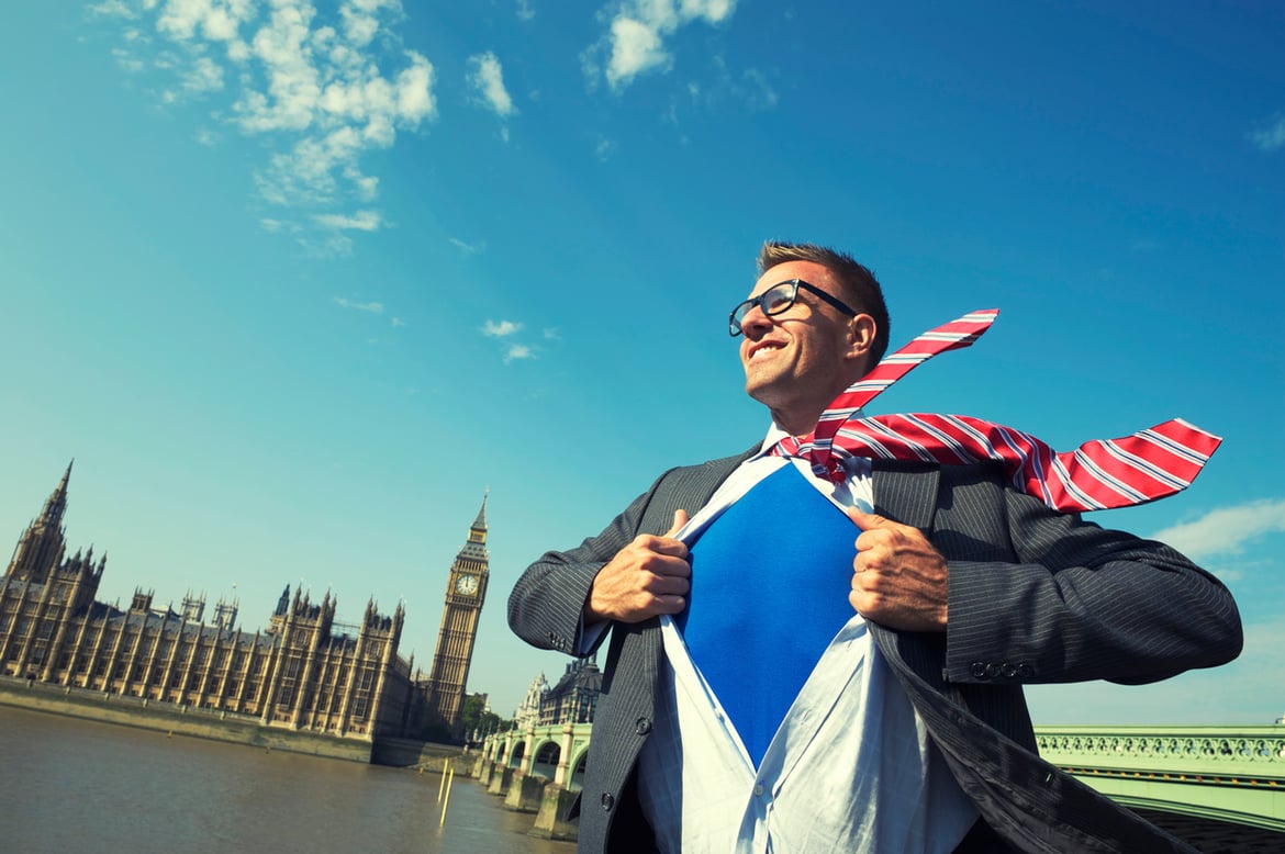 Time for change - businessman changing into a superhero